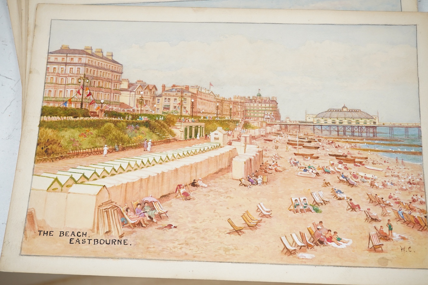 William Affleck, (Aka Carruthers, 1868-1943), a set of seven original watercolours for postcard designs, Eastbourne scenes to include, ‘The Band Enclosure’, ‘The Wish Tower’, ‘Beachy Head’ and ‘The Beach’, each initialle